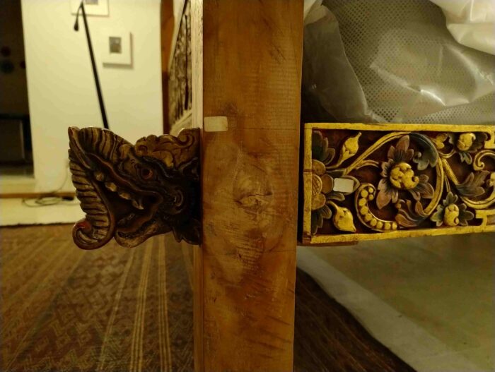 Balinese hand-carved wooden canopy bed. - Image 6